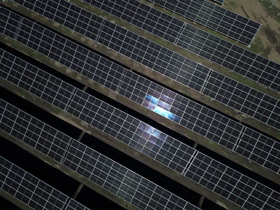Drone view of solar panel rows